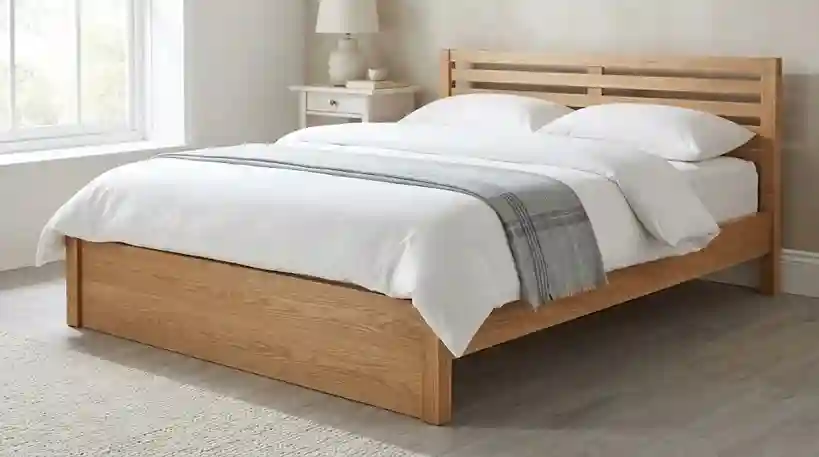 Cama box de madeira maciça moderna e limpa, ilustrando a opção de substituição quando um móvel antigo está severamente infestado por caruncho.